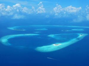 The coral islands of a Maldivian atoll seen from the air