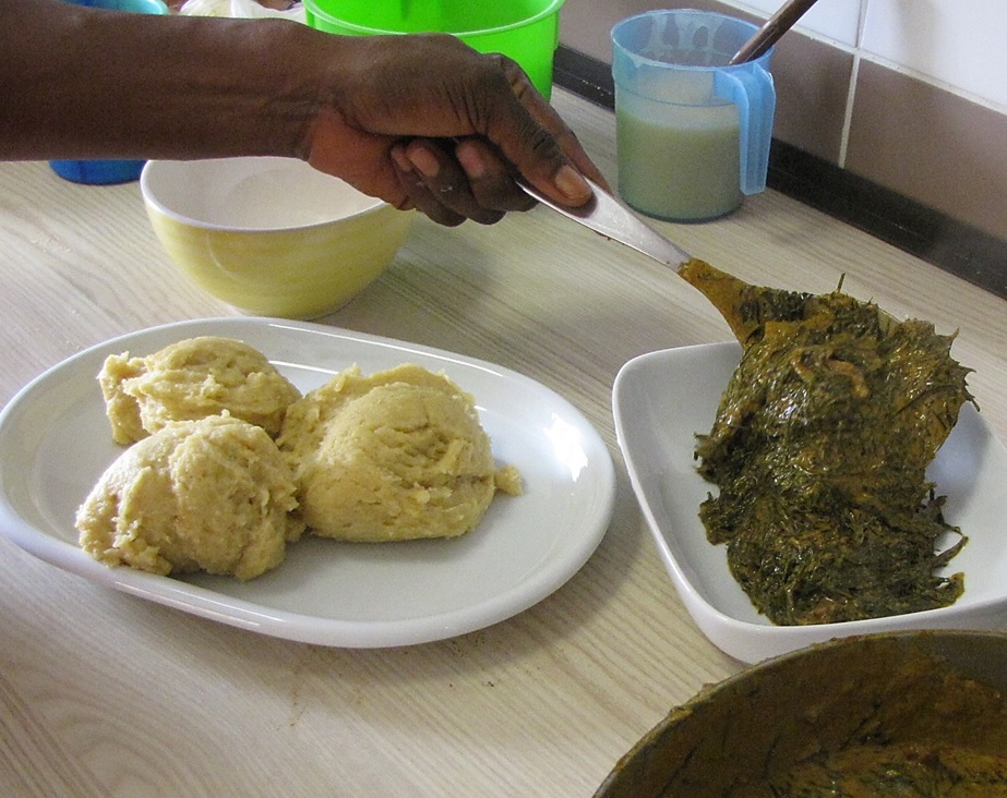 Fumbwa sauce served with fufu, a dish of the Congo.
