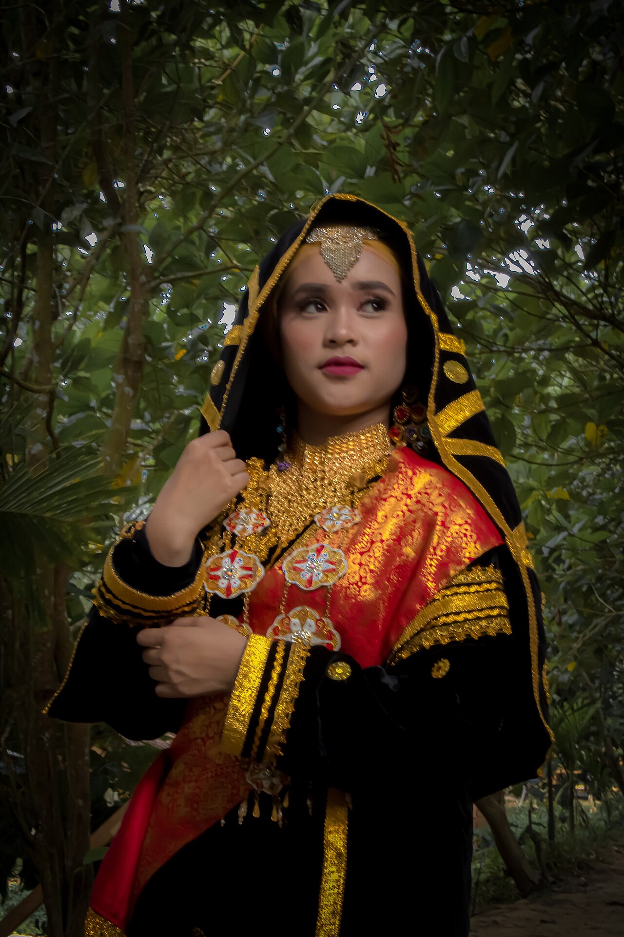 A Minangkabau girl in traditional dress