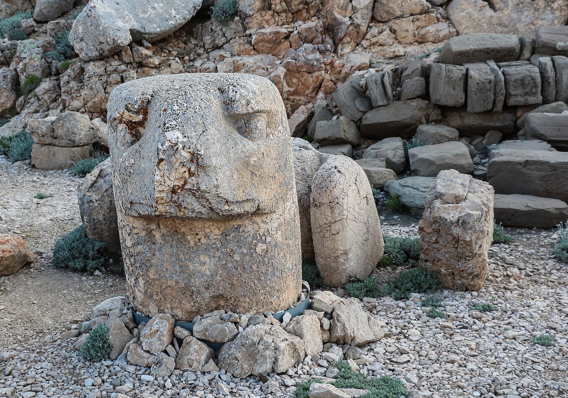The colossal stone heads of Mount Nemrut, scattered before an ancient royal tomb.