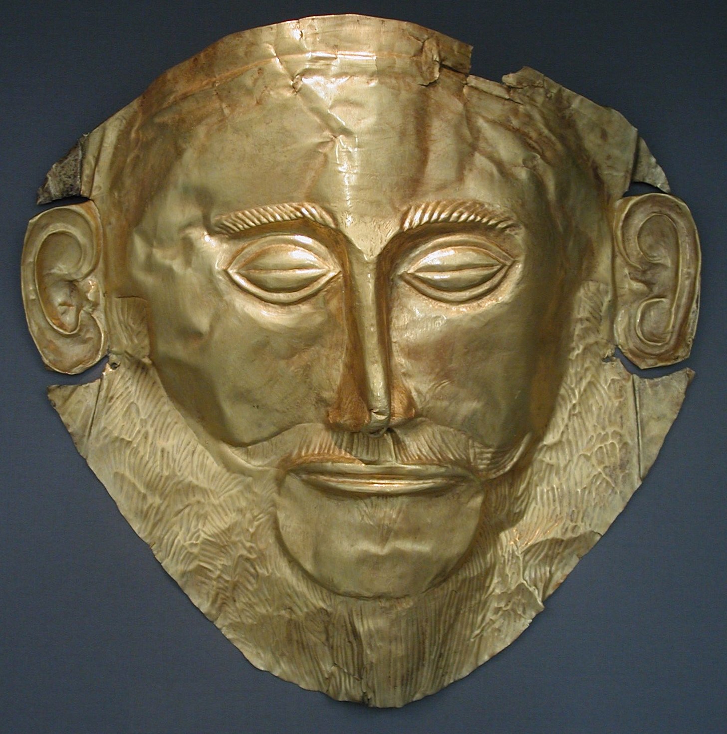 The gold funerary mask once called the Mask of Agamemnon, from Mycenae.
