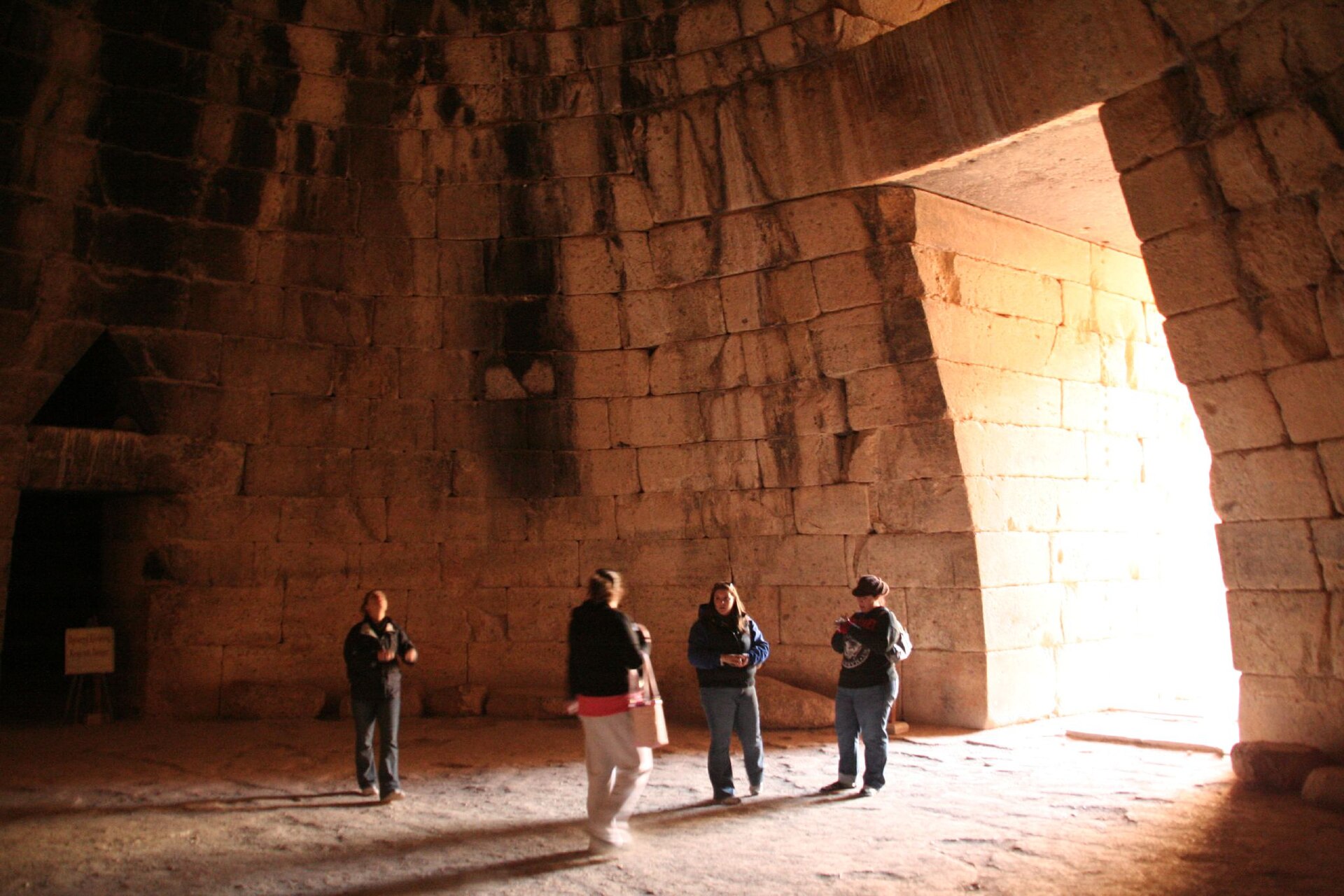 The great entrance to the Treasury of Atreus, a monumental beehive tomb at Mycenae.