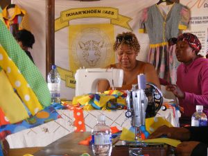 Nama women with the patchwork dress that is a mark of the people.