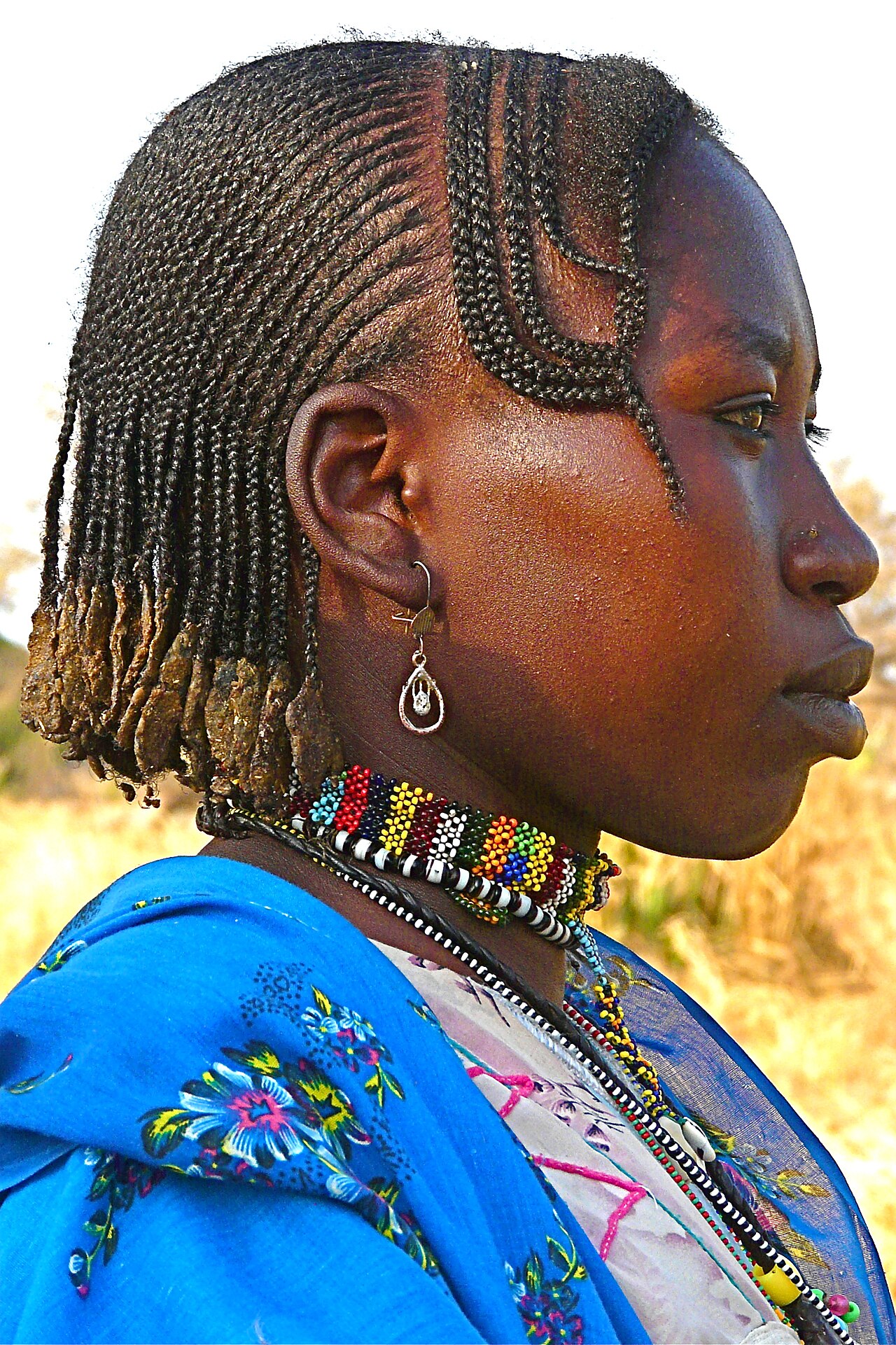 A Nuba woman of Kau; the Nuba speak dozens of distinct languages.
