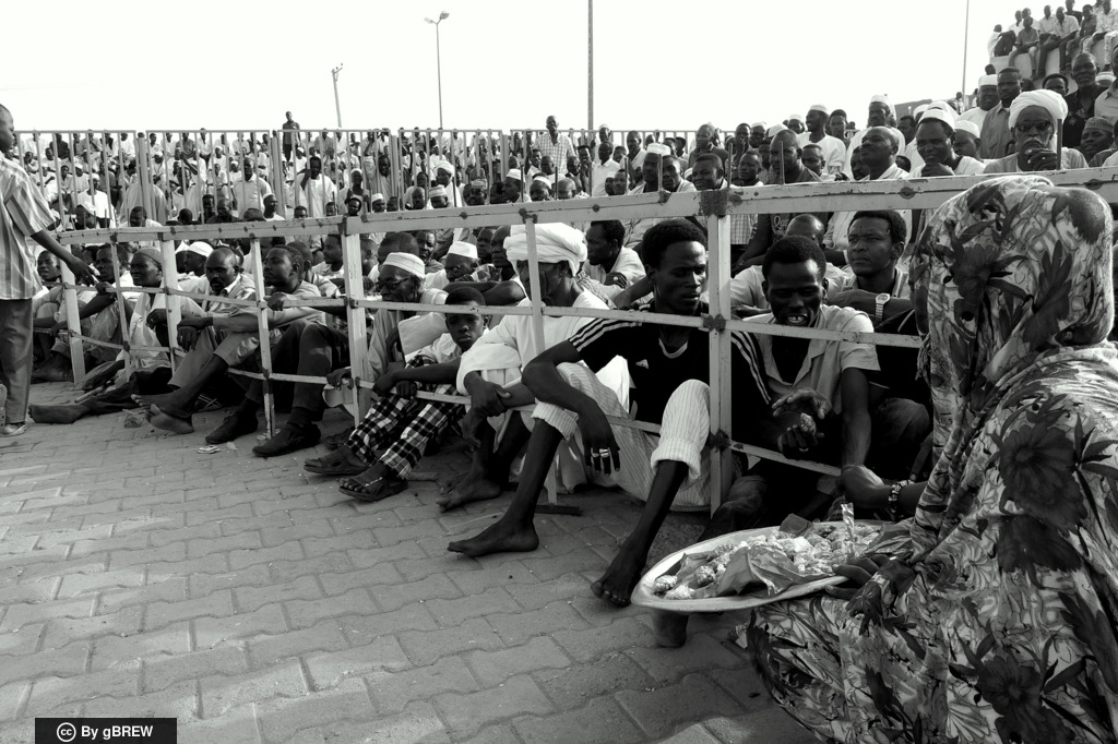 Spectators at a Nuba wrestling match, a great social gathering.