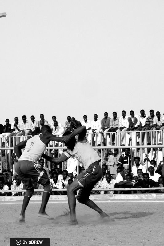 Nuba wrestling in Khartoum, keeping the tradition alive among migrants today.