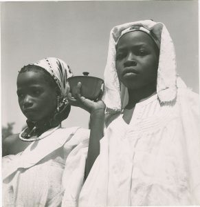 Two Nupe girls in a 1960 photograph; the people speak the Nupe language.