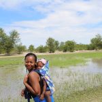 A woman of northern Namibia with her child; the Ovambo are the largest people of Namibia.