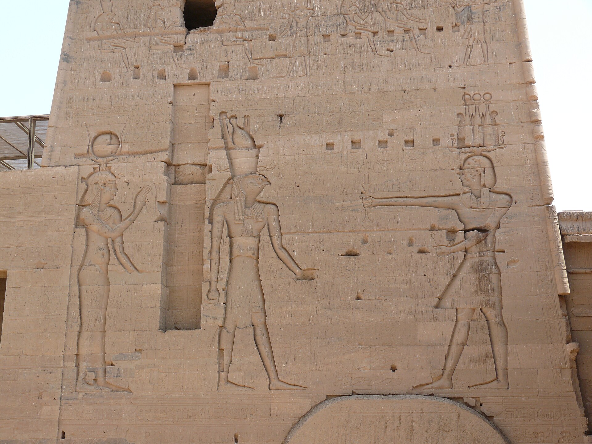 The great pylon of the Temple of Isis at Philae, carved with colossal figures.