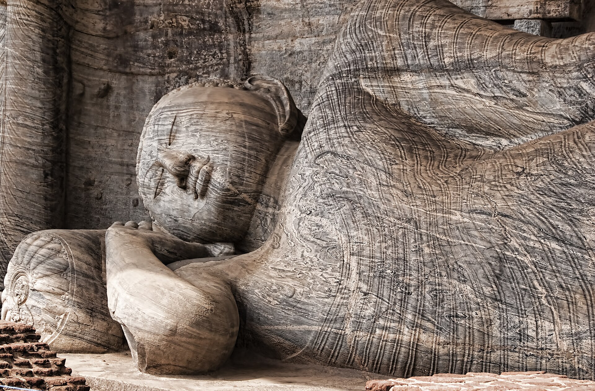 The serene reclining Buddha of Gal Vihara, carved from the living rock.