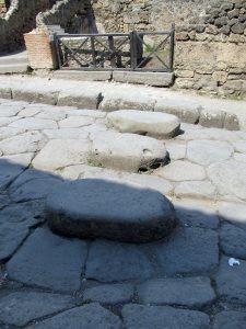 A paved street of Pompeii with its raised stepping stones.