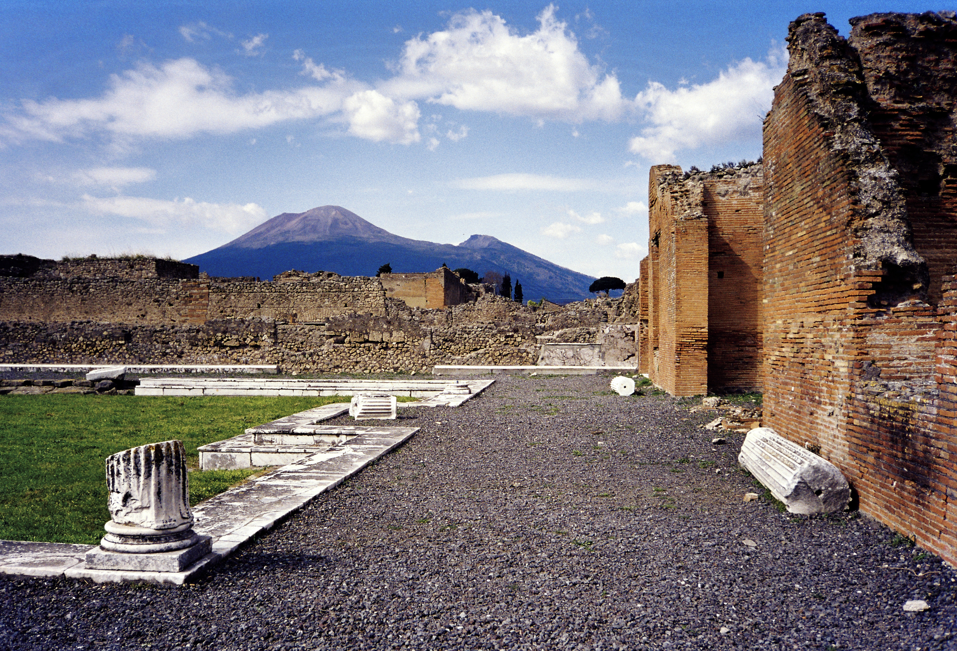 The ruins of Pompeii beneath the slopes of Mount Vesuvius.