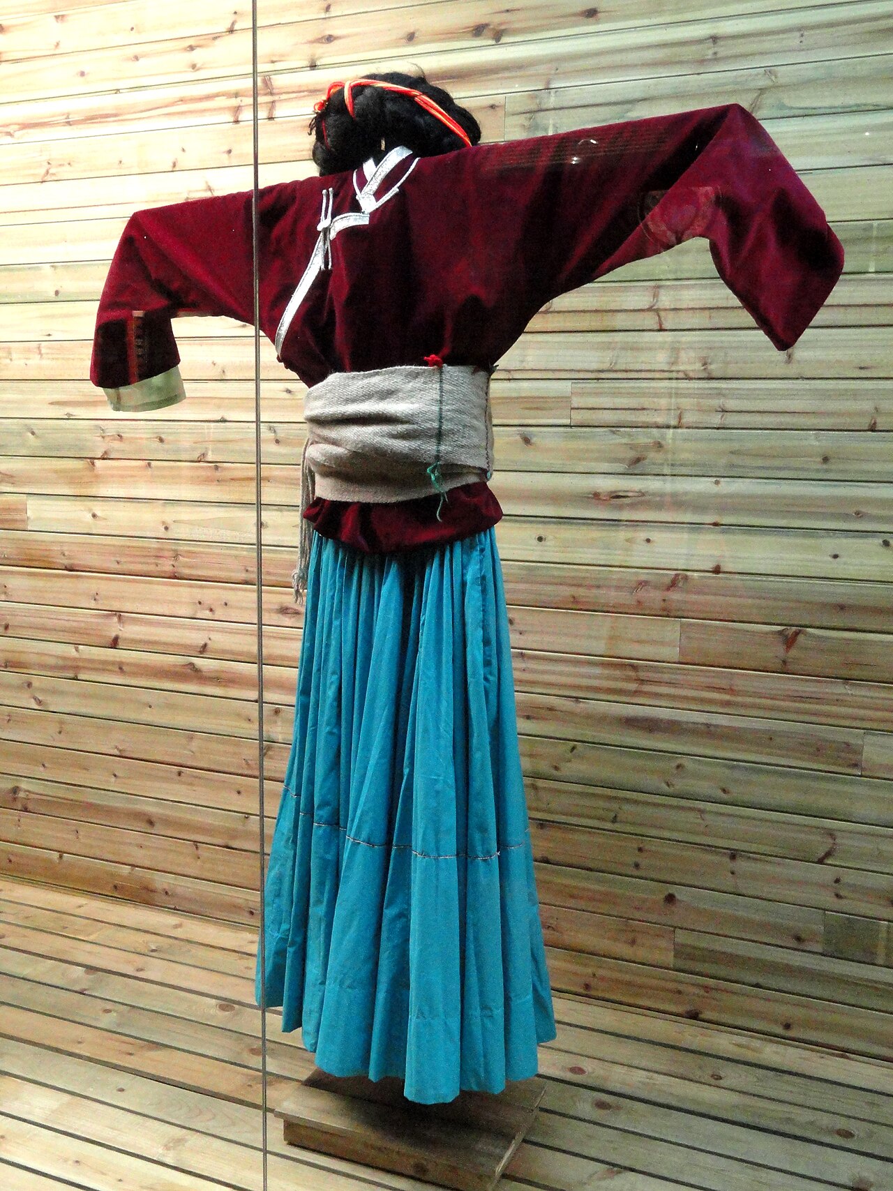 A Pumi woman in traditional dress