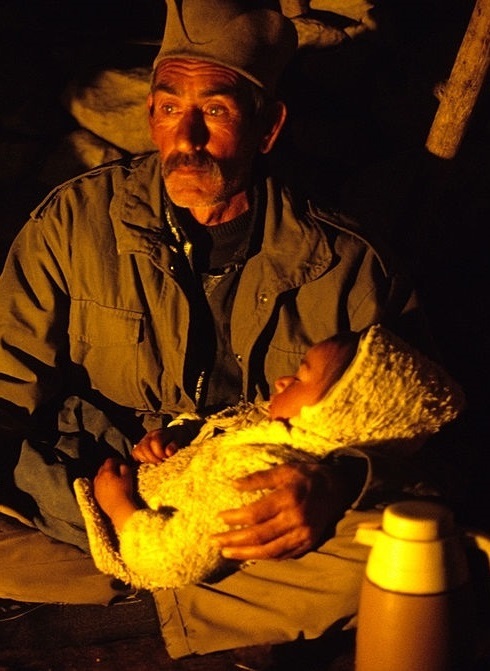 A Qashqai woman with her child; the tribe is a great confederation of clans.