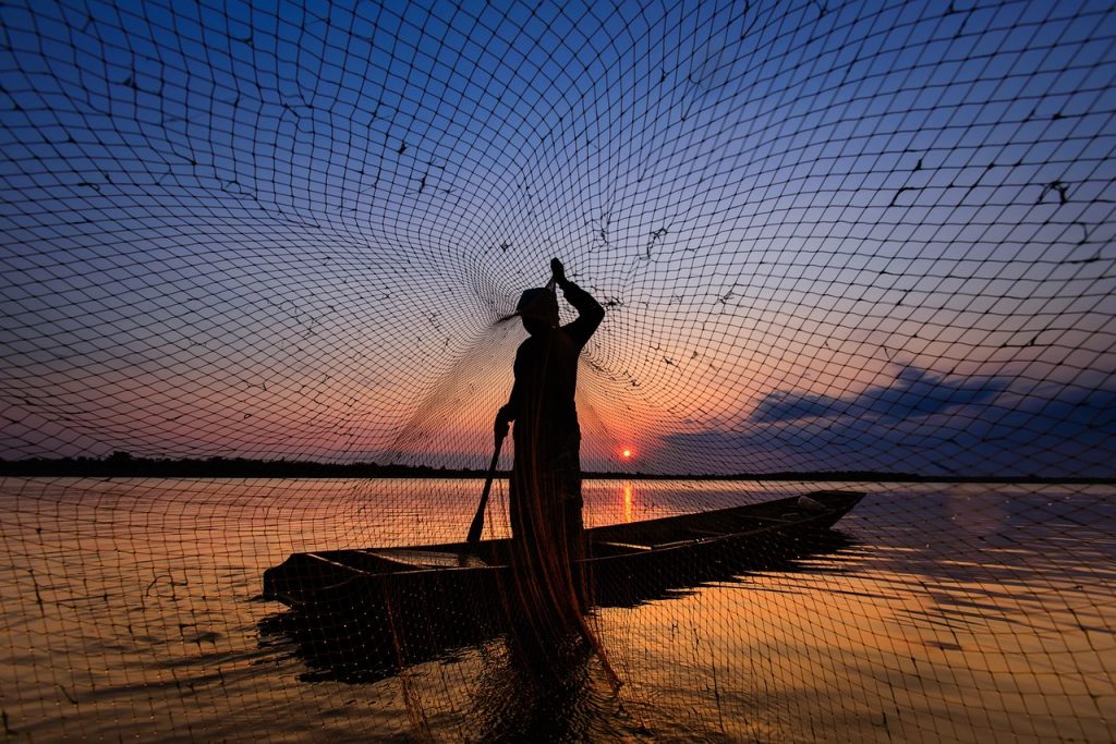 Man fishing with a net