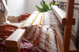 Loom and weaving