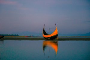 A fishing boat on the Naf River, along the Rakhine coast