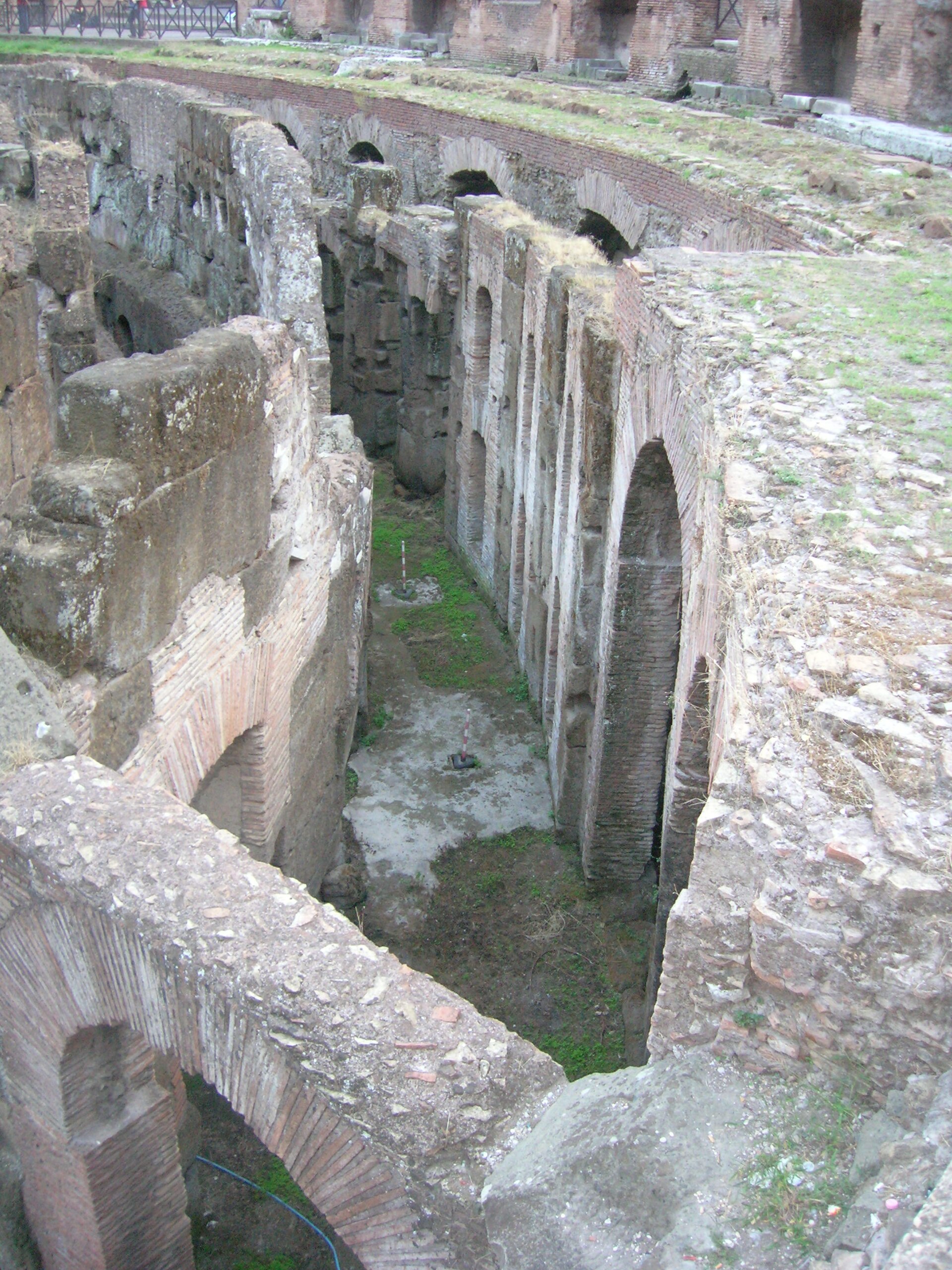 Inside the Colosseum, showing the arena floor and the underground chambers of the hypogeum.