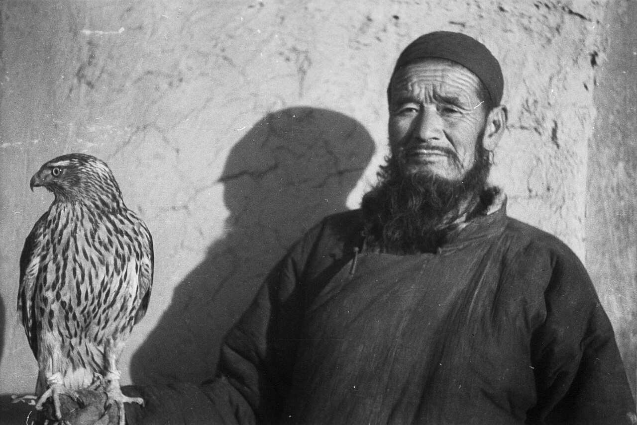 A Salar man with his falcon, 1933