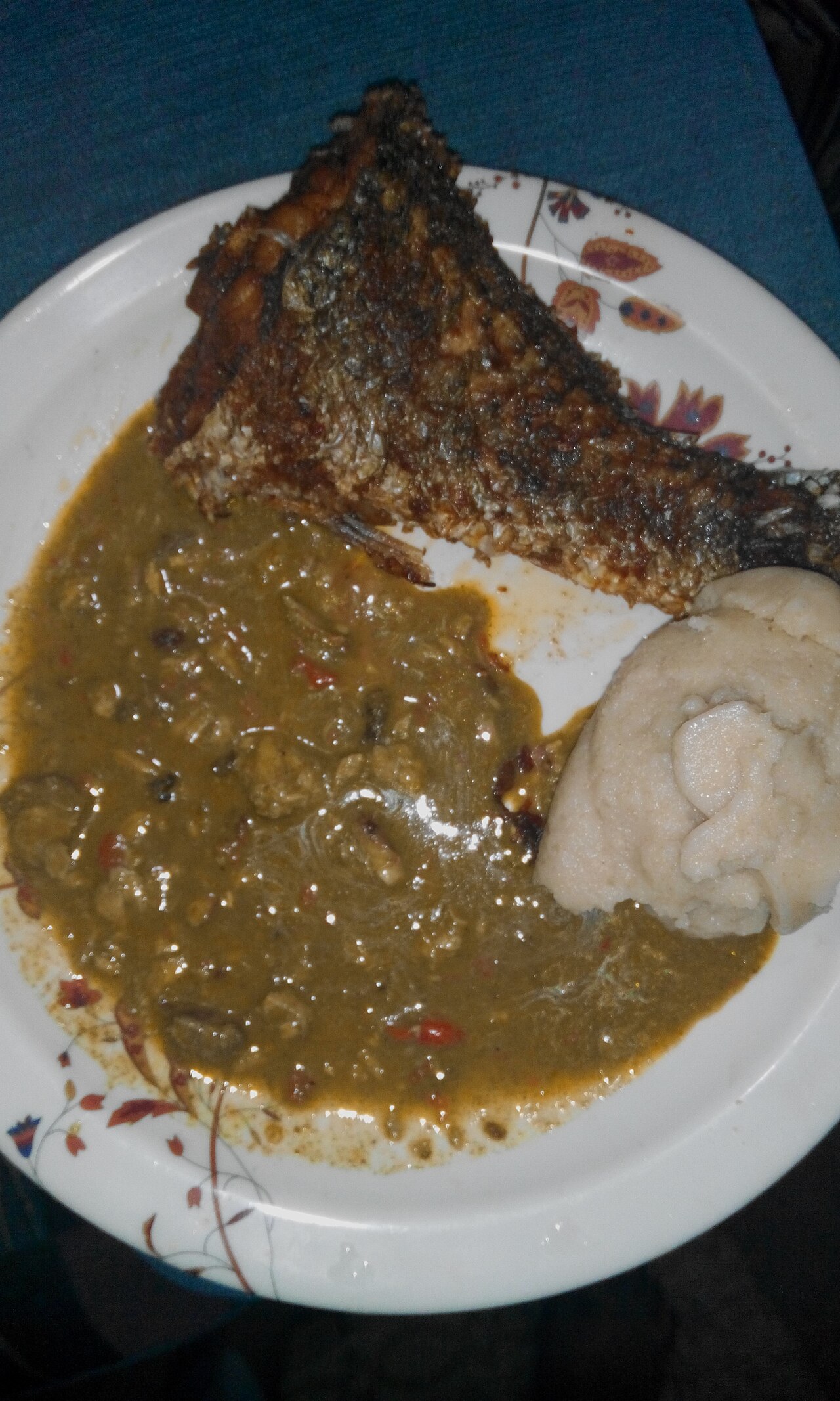 Tuwo, a millet porridge, with sauce and fish, a dish of the savanna.