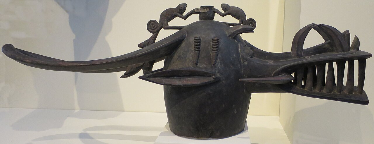 A Senufo firespitter mask, the kponyugo, of the Poro society.