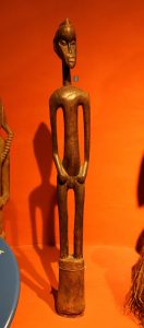 A Senufo figure carved to honour a deceased elder; society is ordered by the Poro.