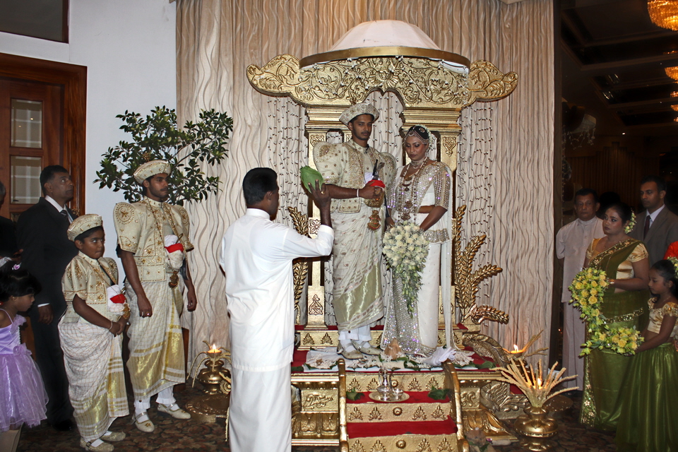 A traditional Sinhalese wedding on the decorated poruwa platform