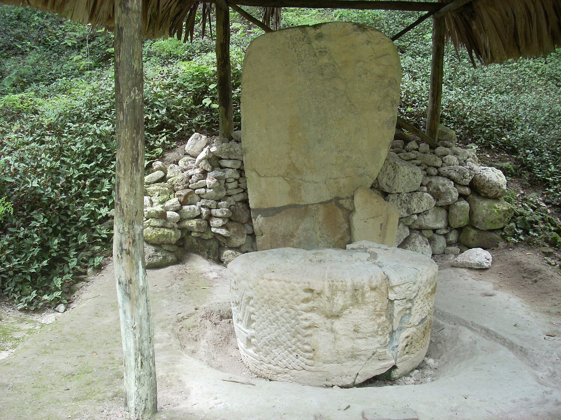 A carved stela at Tikal, recording the deeds and dates of the city's kings
