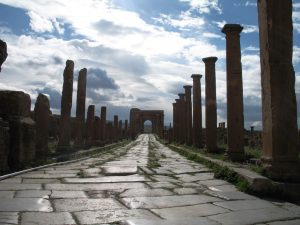 The vast grid of ruins of Timgad on the edge of the Aures Mountains in Algeria.