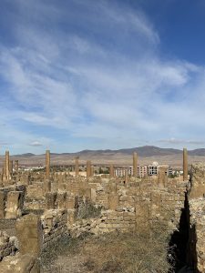 The straight paved streets of Timgad, laid out on a perfect Roman grid.