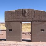 The Gate of the Sun, a monolithic stone doorway carved with a central deity at Tiwanaku
