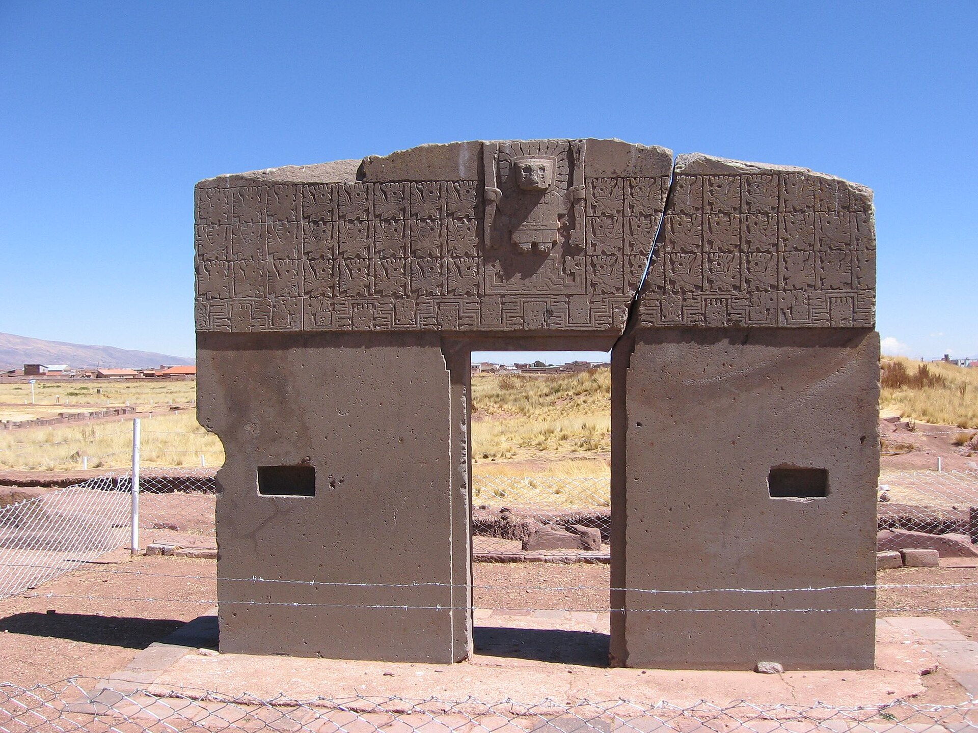 The Gate of the Sun, a monolithic stone doorway carved with a central deity at Tiwanaku