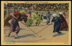 Tohono O'odham women playing toka, a traditional field game of the desert people.