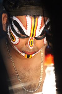 The elaborate makeup and costume of Yakshagana performers