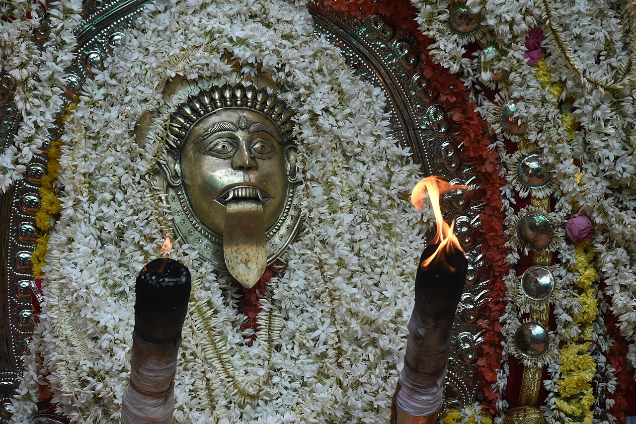 A masked spirit dancer in the Bhuta Kola ritual