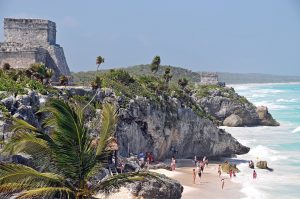 El Castillo at Tulum, standing on a cliff overlooking the sea.
