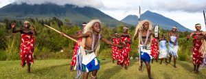 Rwandan dancers in traditional dress at a cultural celebration.