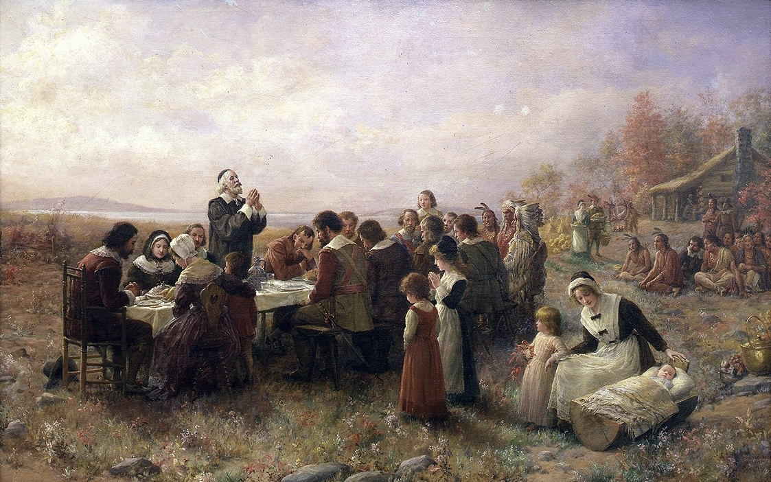 A painting of the first Thanksgiving at Plymouth, 1621.