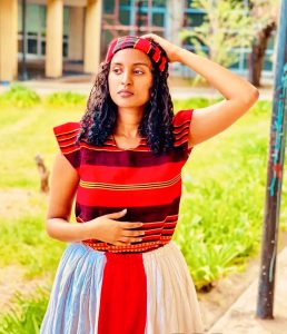 A Wolayta girl in traditional dress for a celebration.