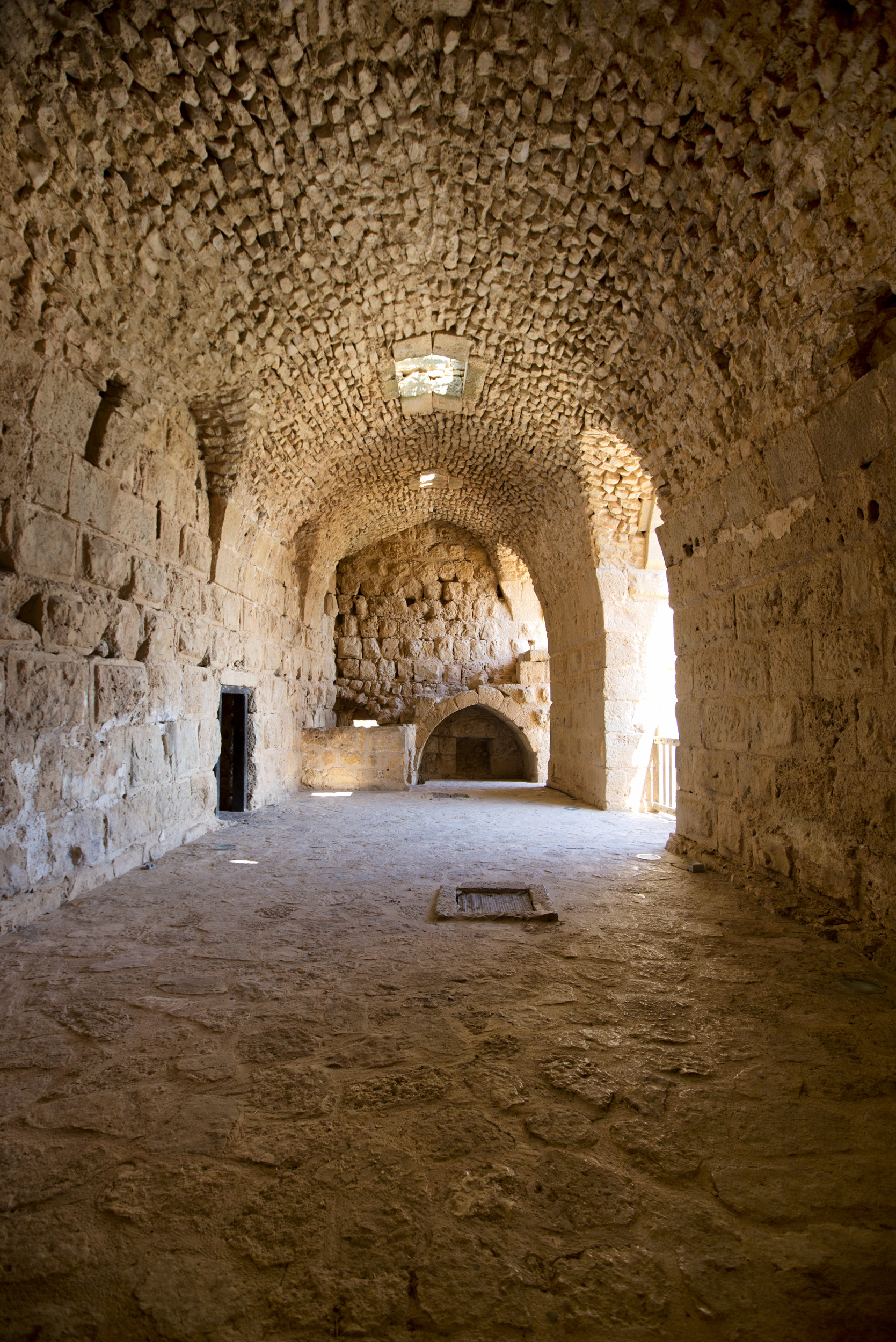Within the walls lie vaulted halls, staircases, cisterns, and chambers on several levels.