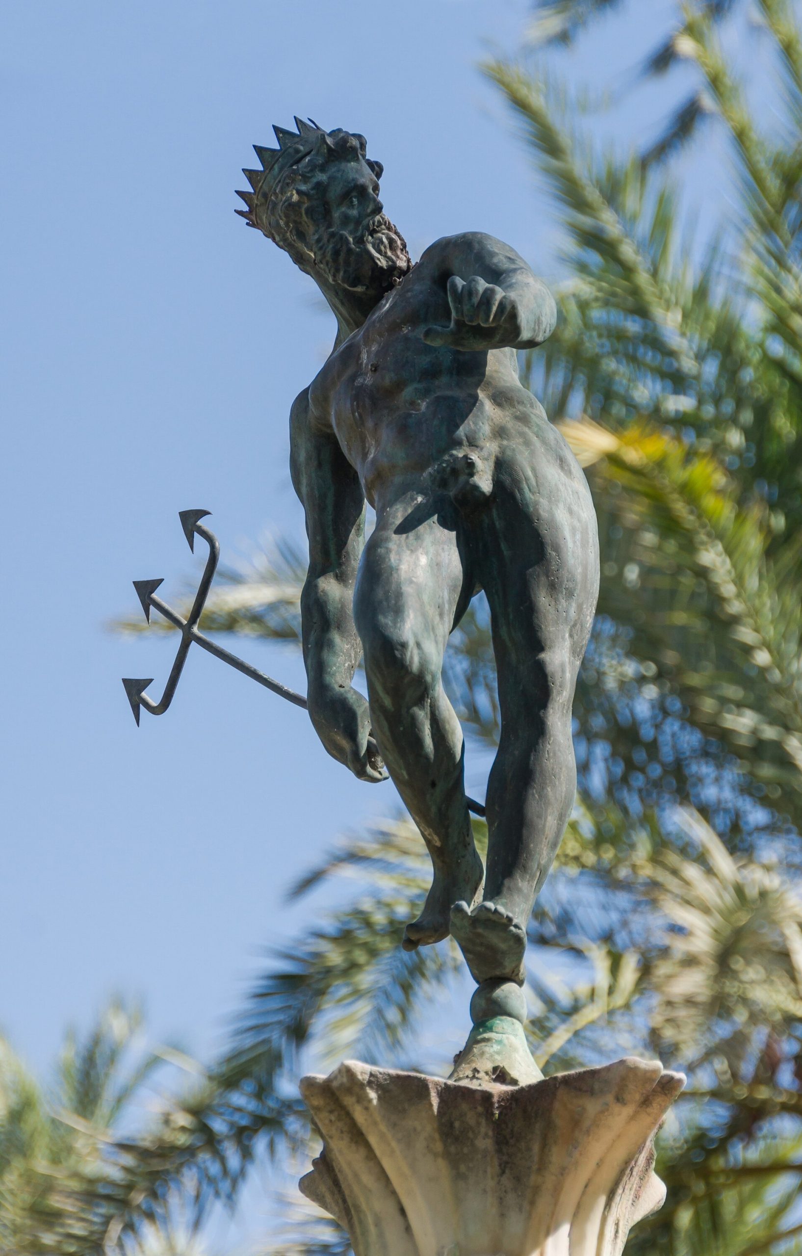 A pool with the bronze figure of Neptune in the gardens