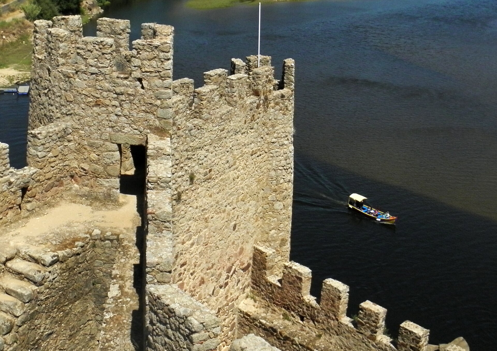 The only way to the castle is a short boat ride across the river.