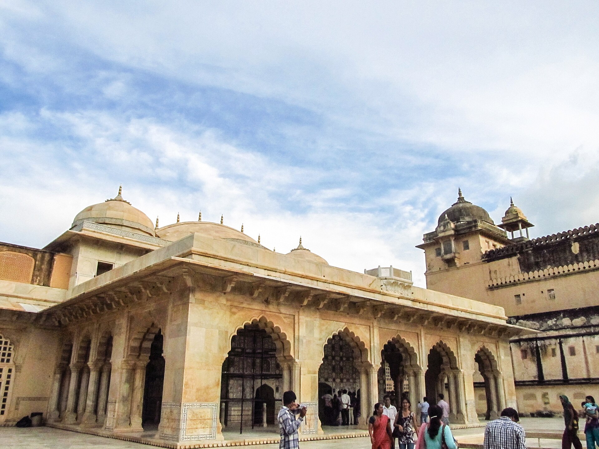 The fort is arranged around four great courtyards, entered through the Suraj Pol or Sun Gate.