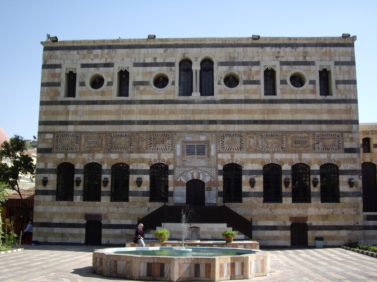 A courtyard of the Azm Palace with its banded stone.