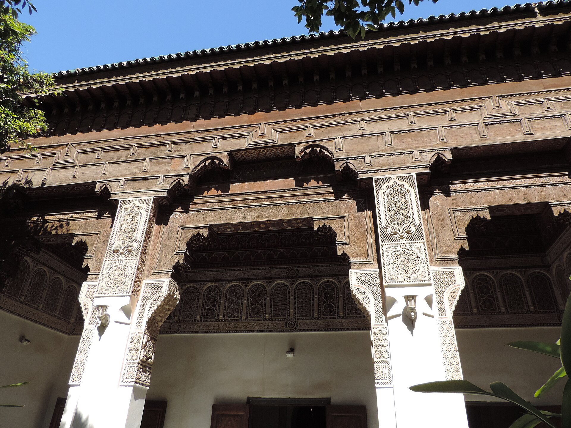 A decorated facade within the Bahia Palace, its plain outer walls hiding the splendor within.