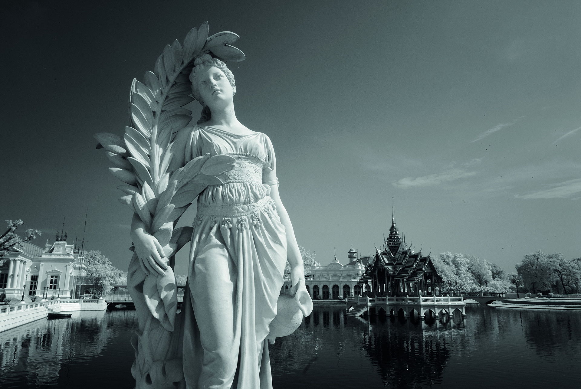 A pavilion of the palace reflected in the ornamental water