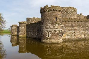 The low, symmetrical outline of Beaumaris, the last of Edward I's Welsh castles