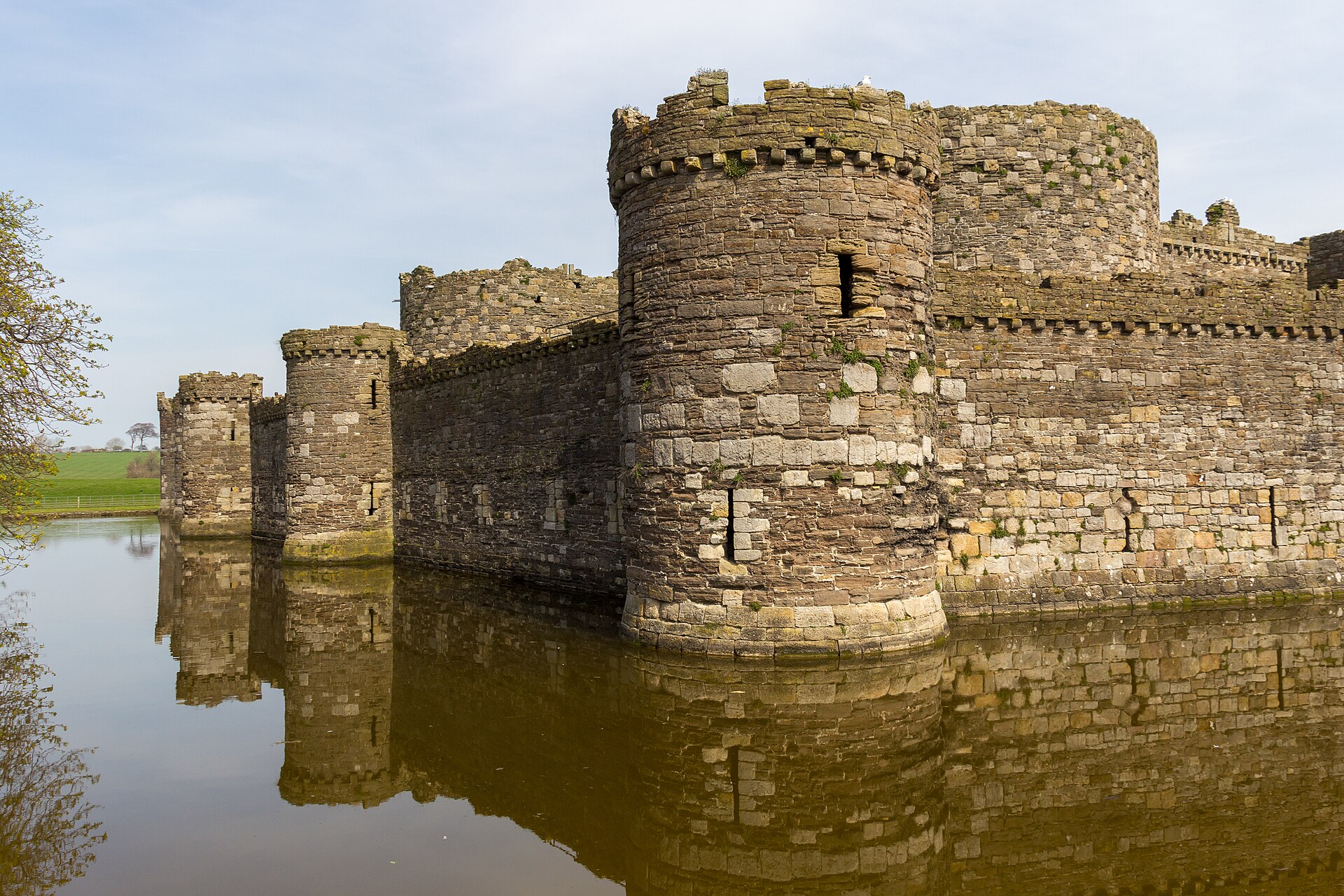 The low, symmetrical outline of Beaumaris, the last of Edward I's Welsh castles