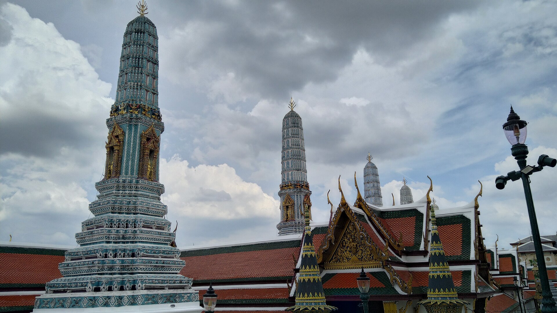 A view within the Grand Palace complex, dense with gilded spires and pavilions.