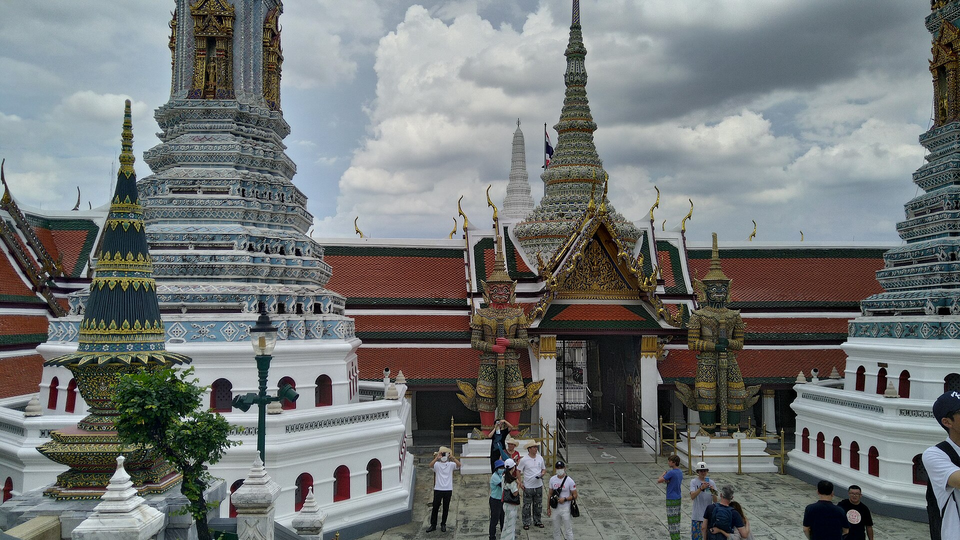 The Grand Palace, a whole royal city glittering with gold and color.